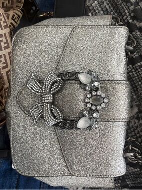 Aldo Silver Glitter Crossbody with Jeweled Bow Accent